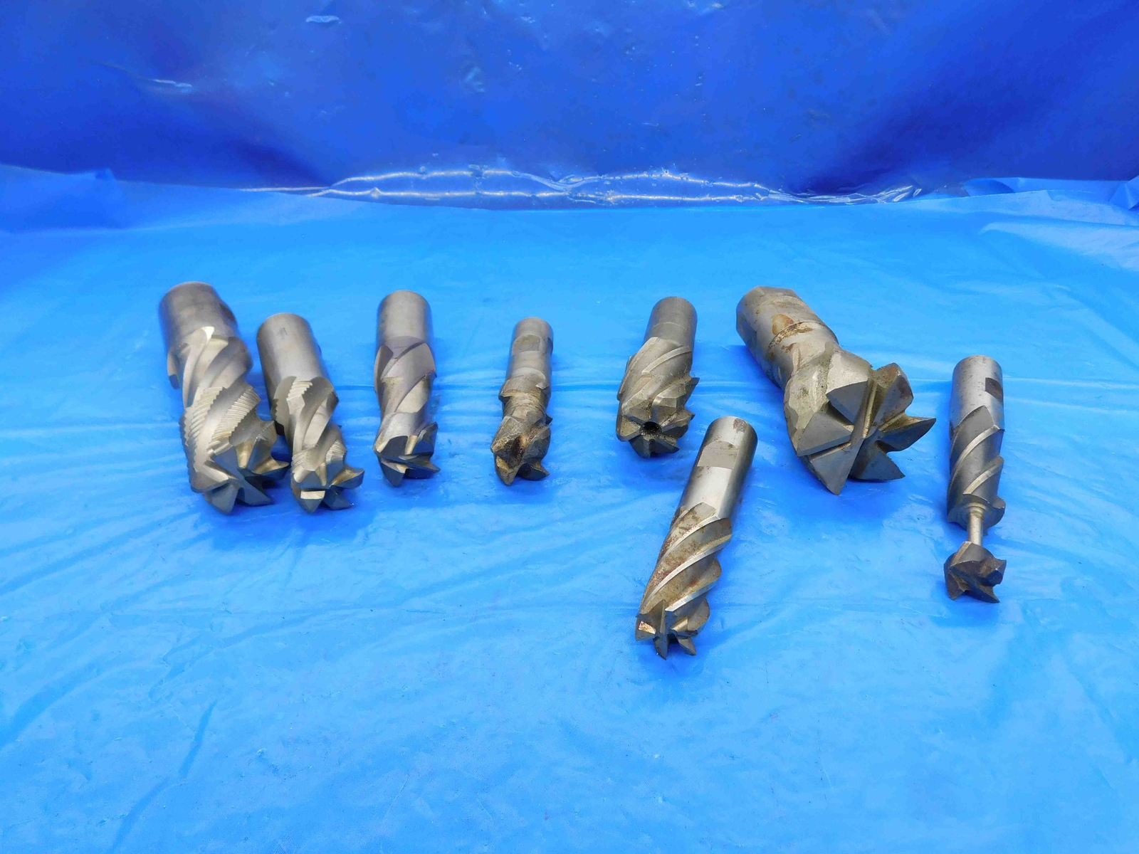 8PCS MODIFIED HSS END MILLS VARIOUS SIZES FROM 45/64 – 59/64 ROUGHING SQUARE